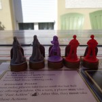 Argent the consortium figurines à contre jour